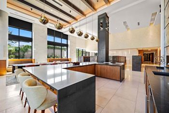 Entertaining kitchen and resident social lounge with plenty of cozy seating for gathering and entertaining friends
